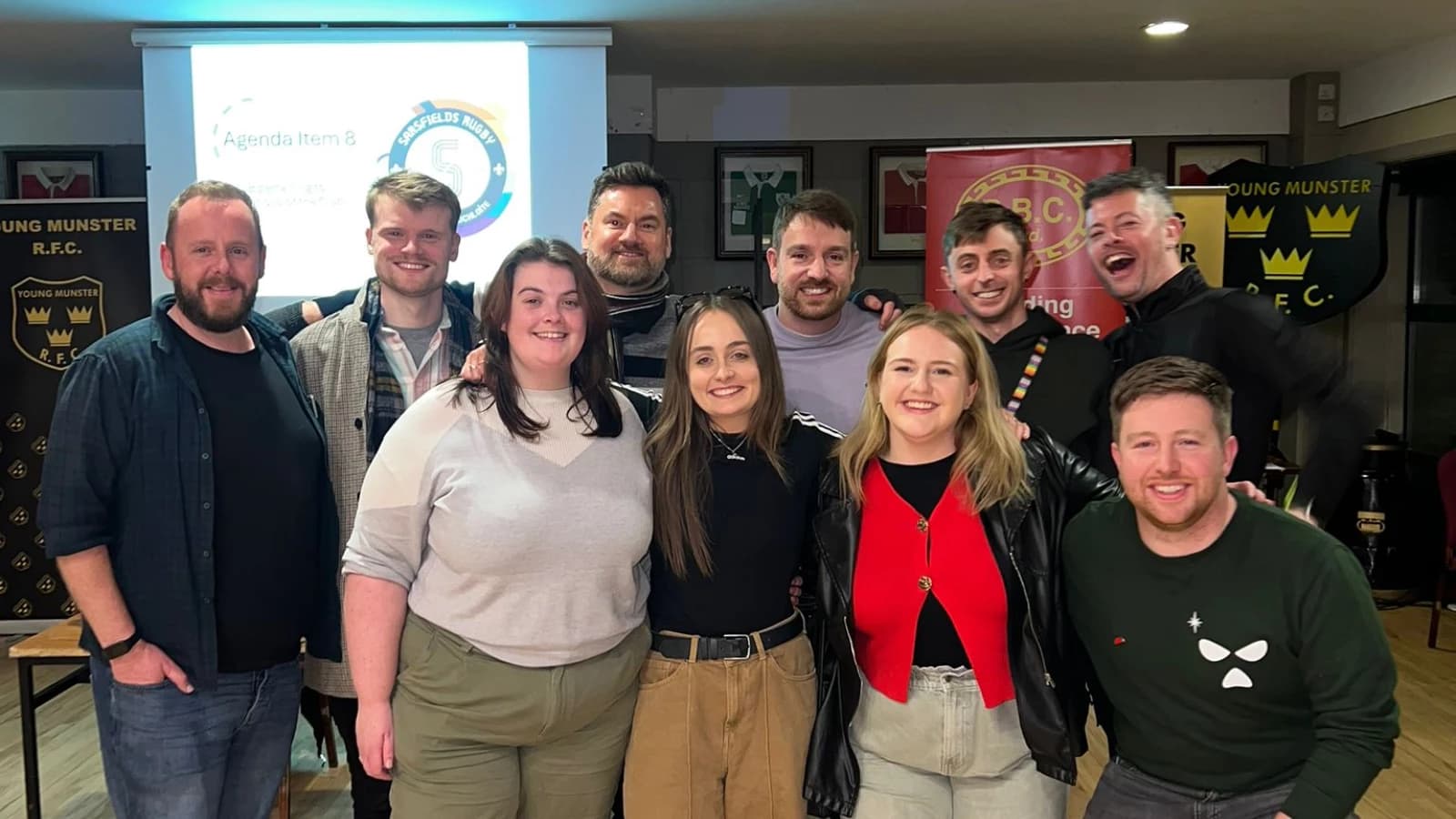 Members of the Sarsfields Rugby committee gathered indoors